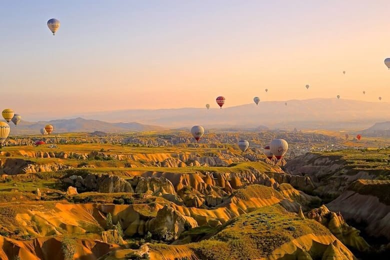 Image of ballons flying over canyons with mask pattern four.